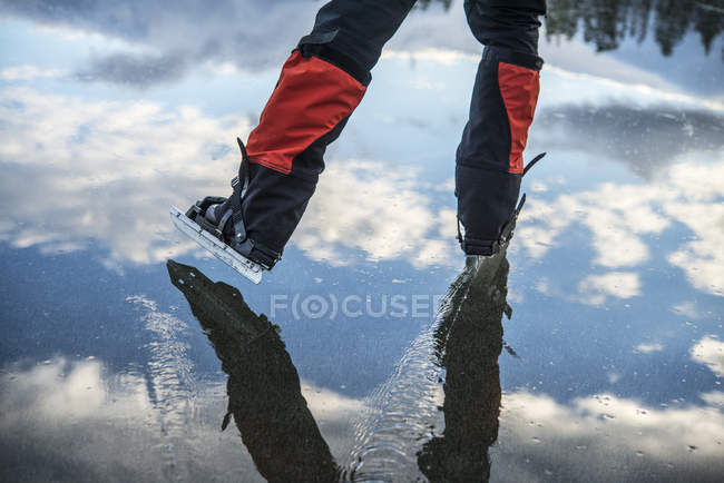 Low-section of mature man ice-skating in Jamtland, Sweden — Stock Photo