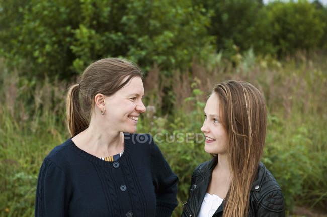 Portrait of mother and daughter, selective focus — Stock Photo