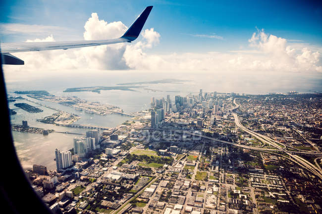 View of Miami cityscape from airplane with wing — Stock Photo