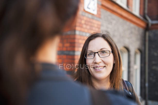 Two women talking, selective focus — Stock Photo