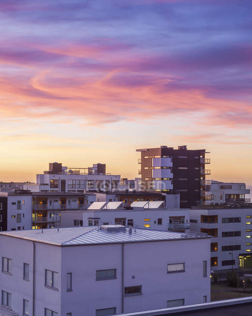 Residential district buildings under sunset sky — Stock Photo
