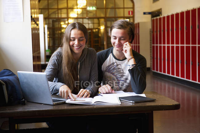 Students learning at school, focus on foreground — Stock Photo