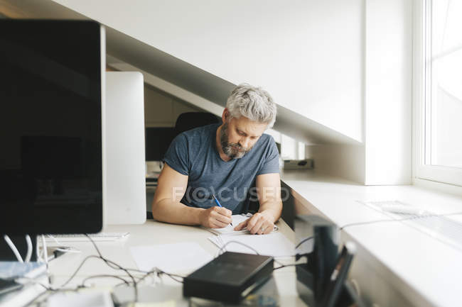 Businessman working at office, selective focus — Stock Photo