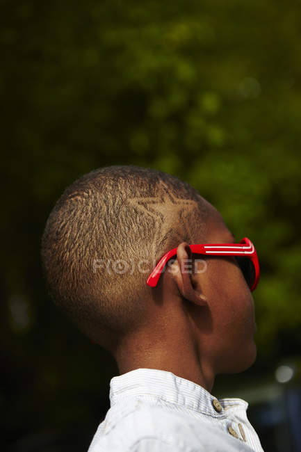 Boy with star shape haircut, selective focus — people, short hair - Stock  Photo | #189048056