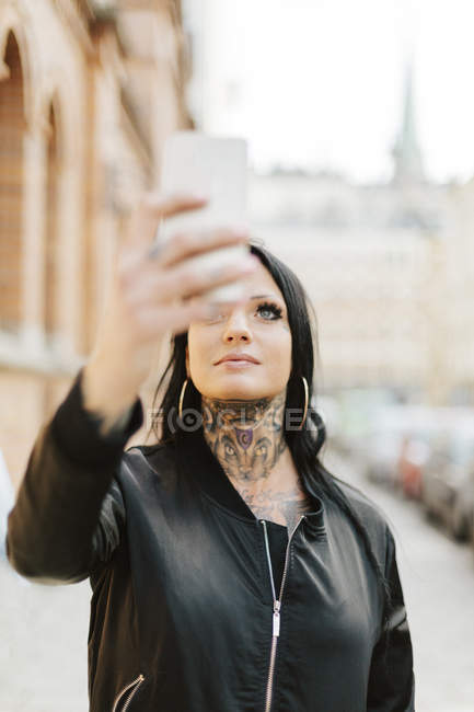 Woman taking photo, selective focus — Stock Photo
