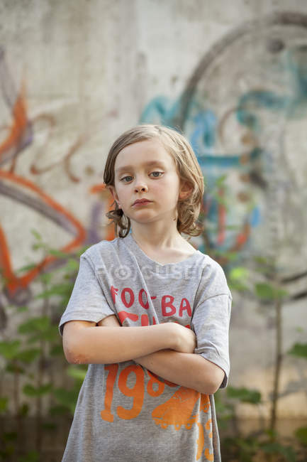 Boy with crossed arms, selective focus — Stock Photo