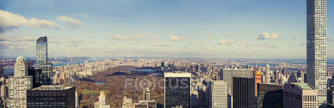 Cityscape of New York City under sky with clouds — Stock Photo