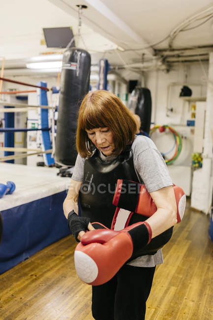 Woman at boxing training, selective focus — Stock Photo