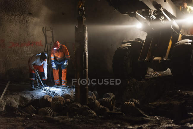 Miners working underground, selective focus — Stock Photo