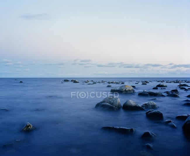 Scenic view of sea and rocks, selective focus — Stock Photo