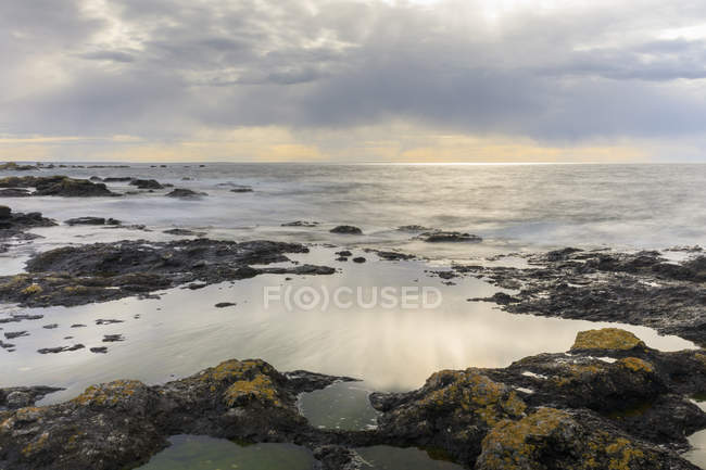 Rock formation under overcast sky in Digerhuvud, Sweden — Stock Photo