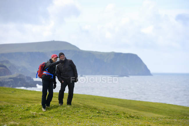 Senior woman and man looking at view, focus on foreground — Stock Photo