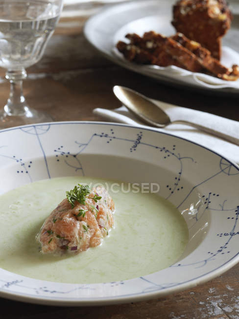 Asparagus soup with salmon tartare, selective focus — Stock Photo