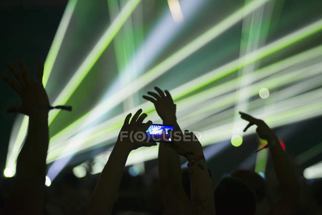 Man taking photos with smartphone at Summer Sound Festival — Stock Photo