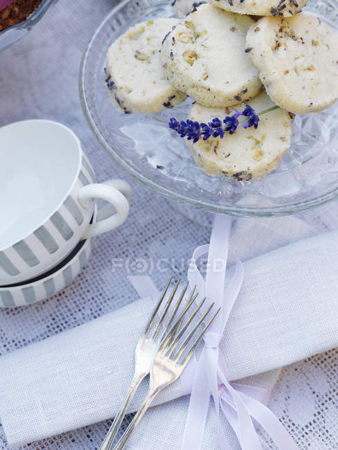 Elevated view of lavender shortbreads on cake stand — Stock Photo
