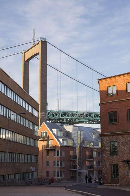 City street with Alvsborg Bridge in background — Stock Photo