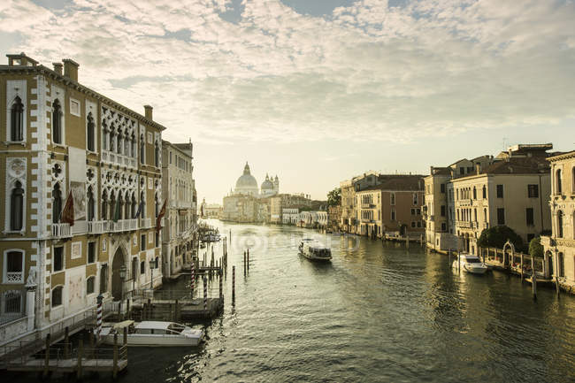 Canal in Venice at sunrise, italian republic — Stock Photo