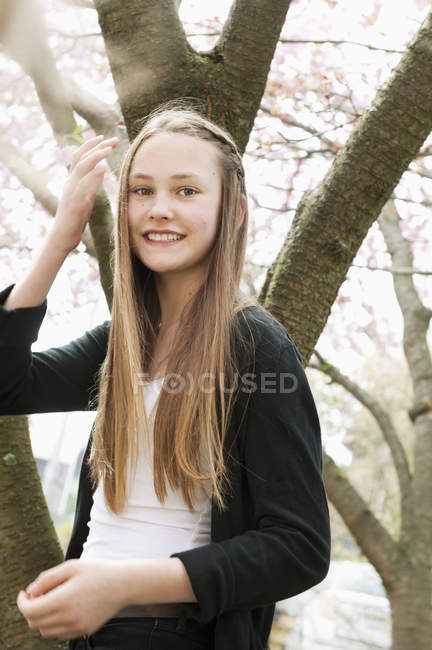 Portrait Of Teenage Girl Looking At Camera Long Hair Blonde