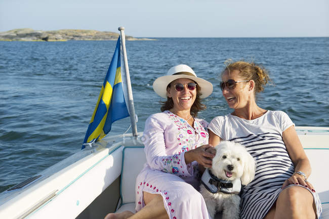 Portrait of two mature women on boat, selective focus — Stock Photo