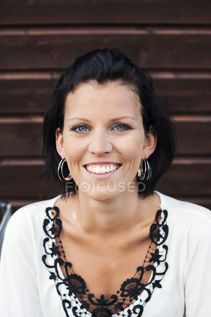 Portrait of mid adult woman looking at camera — Stock Photo