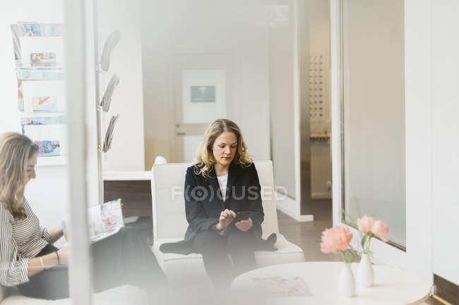 Clients waiting at hairdresser, selective focus — Stock Photo