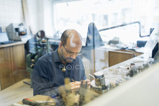 Goldsmith working at workshop, selective focus — Stock Photo