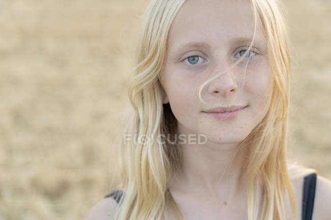 Portrait of teenage girl, focus on foreground — Stock Photo