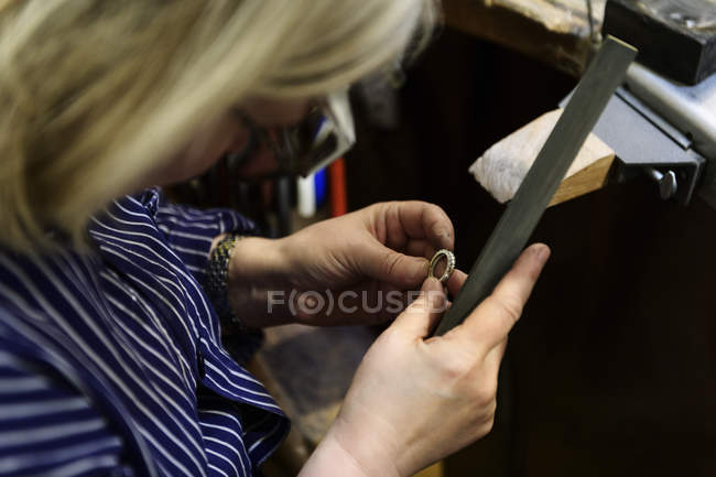 Goldsmith working on ring, selective focus — Stock Photo