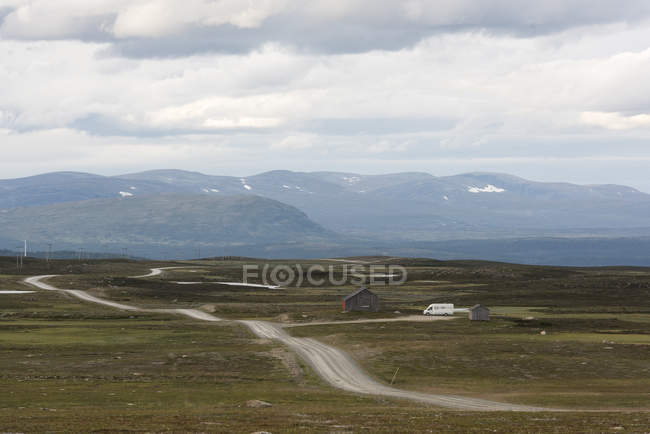 Rural road and Flatruet Mountain in Harjedalen, Sweden — Stock Photo