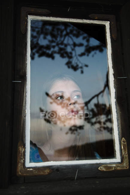 Portrait of young woman in summerhouse in Dalarna, Sweden — Stock Photo