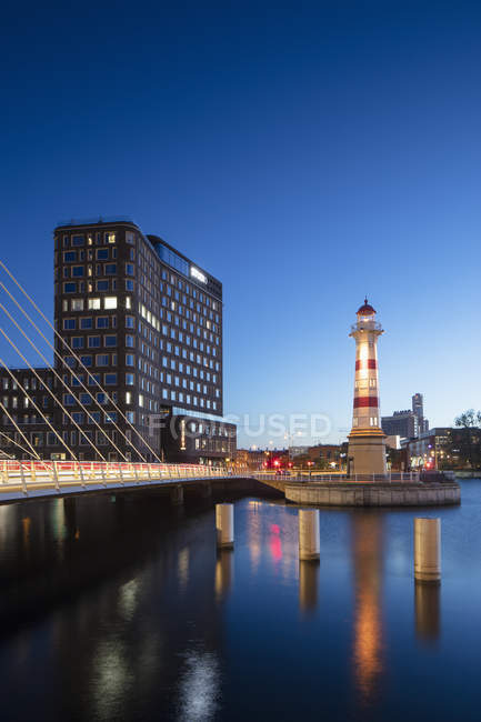Lighthouse by river at sunset in Malmo, Sweden — Stock Photo