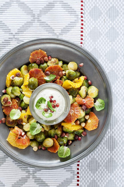 Salad with Brussels sprouts and orange — Stock Photo