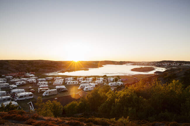 Campervans at camping ground during sunset — Stockfoto
