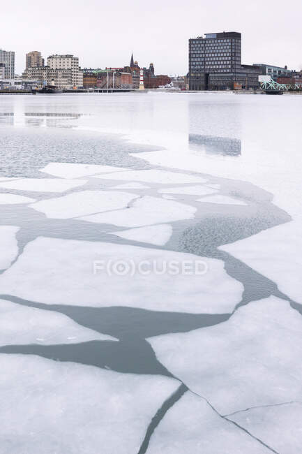 Buildings and ice in harbour of Malmo, Sweden — Stock Photo