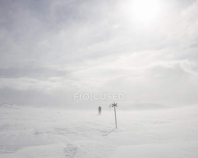 Clouds under snowy field — Stock Photo