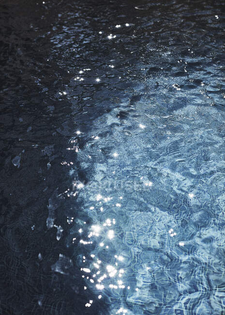 Rippled water in swimming pool — Stock Photo