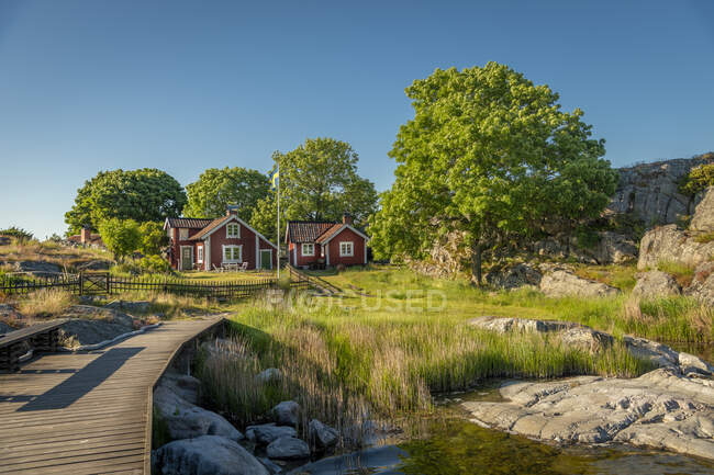 Scenic view of Cabins and pier — Stock Photo
