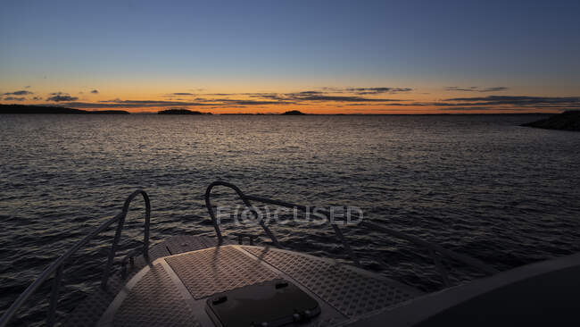 Bow of boat at sunset — Stock Photo
