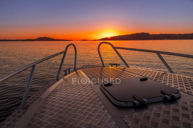 Bow of boat at sunset — Stock Photo