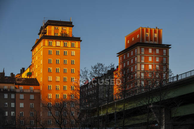 Apartment buildings at sunset — Stock Photo