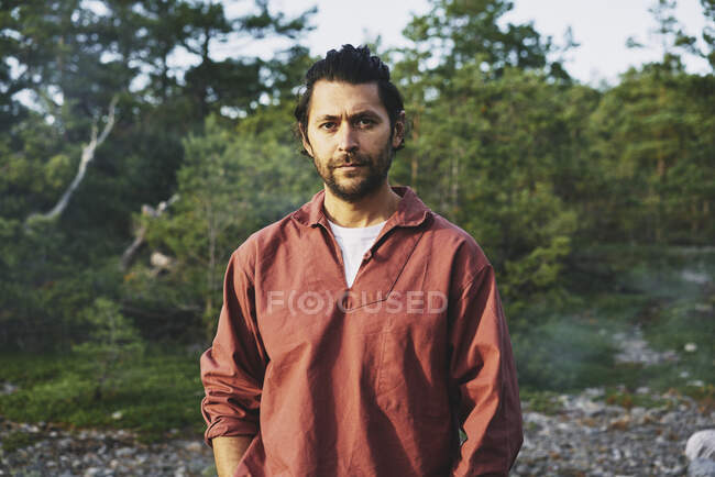 Portrait of man in forest — Stock Photo