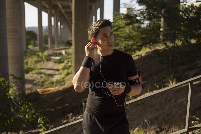 Young man listening to music — Stock Photo