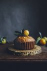 Citrus bundt cake with Cointreau and lemon curd on wooden board — Stock Photo