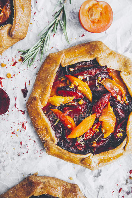 Close-up of Homemade plum galette with rosemary — Stock Photo