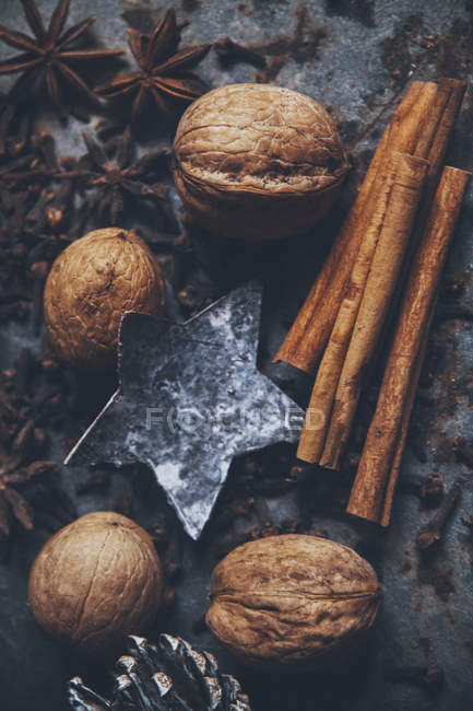 Close-up of baking spices on grey tabletop — Stock Photo