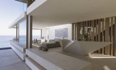 Modern, luxury home showcase interior with ocean view — Stock Photo