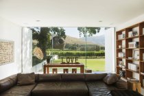 Living room overlooking garden — Stock Photo