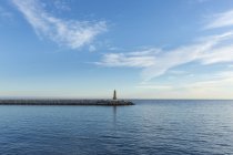 Lighthouse on jetty during daytime — Stock Photo