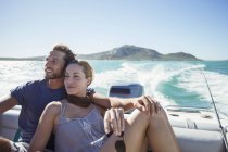 Couple sitting on boat together — Stock Photo