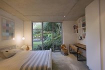 Home showcase interior childs bedroom open to garden — Stock Photo